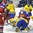 ST. CATHARINES, CANADA - JANUARY 15: Players from Team Sweden and Team Russia scramble for the puck in front of goaltender Valeria Tarakanova #1 during bronze medal game action at the 2016 IIHF Ice Hockey U18 Women's World Championship. (Photo by Francois Laplante/HHOF-IIHF Images)

